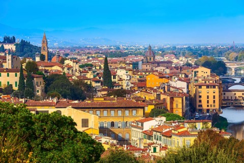 Florence, Italy city panorama with Oltrarno houses Santo Spirito tower and Ponte Vecchio bridge