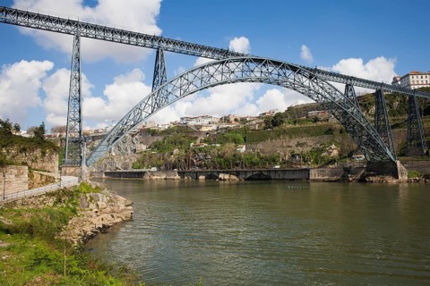 Maria Pia Bridge in Porto, Portugal, wrought iron railway arch bridge over Douro river, opened in