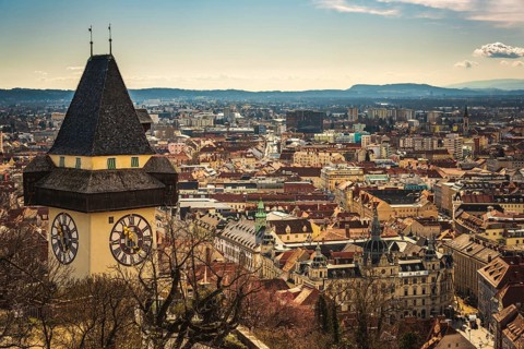 Graz, Austria, 10.03.2020: Uhrturm landmark in Graz cityscape view, Styria region of Austria.