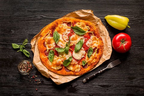 Delicious pizza concept wooden table