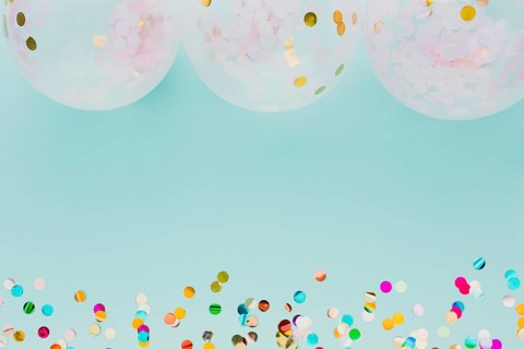 Flat lay party decoration with balloons blue background. Beautiful photo
