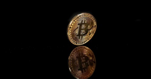 Bitcoins on Black Background