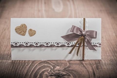 Invitation card for wedding on wood board