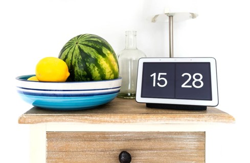 2020-08-31 Hamburg, Germany: Google Nest Hub smart display and smart speaker on kitchen shelf with