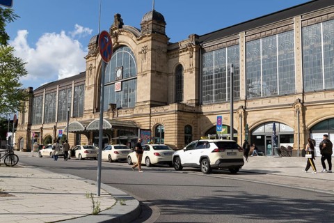 Taxis parked at a taxi rank in front of Dammtor train station in Hamburg, Germany, Europe