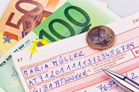 A payment slip for bank transfer or cash deposit with IBAN and BIC code from Austria