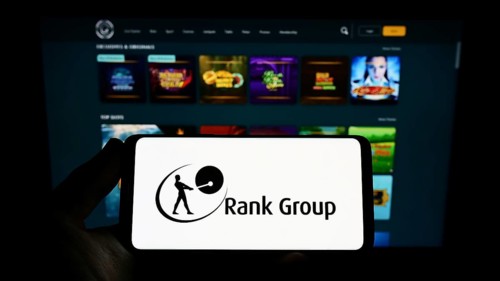 Stuttgart, Germany, 09-15-2022: Person holding smartphone with logo of British gambling company The