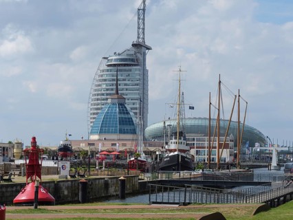 Modern buildings and ships in the harbour, with lighthouse and maritime atmosphere, bremerhaven,