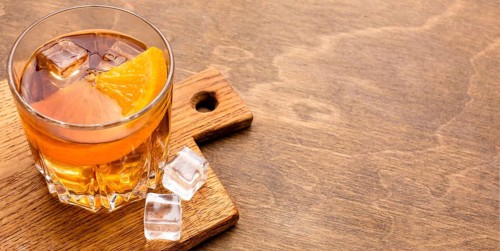 High angle whiskey orange with copy space