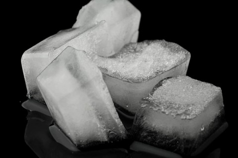 Pile ice cubes front view