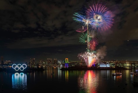 A picture of the fireworks commemorating the opening of the Olympic Rings in the Tokyo Bay,