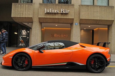 Switzerland: A orange Lamborghini in front of Julius Bär bank at Bahnhofsstrasse in Zurich city