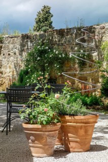 PIENZA, TUSCANY, ITALY - MAY 19 : Potted plants in a restaurant in Pienza on May 19, 2013