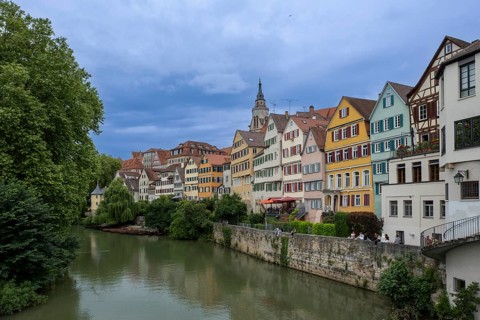 Old town houses in Tübingen with Hölderlin Tower (l.) and St George's Collegiate Church on the