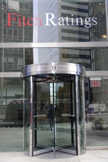 Modern glass doors lead to the Fitch Ratings building, Manhattan, New York City, New York, USA,