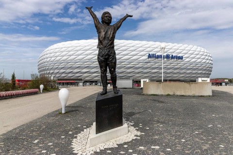 Gerd Müller monument and Allianz Arena football stadium in the background, Munich, Upper Bavaria,