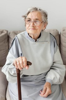 Grandmother with eyeglasses home