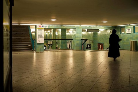 Germany, Berlin, 17. 09. 2020, Alexanderplatz underground station, lone woman, veiled in black,