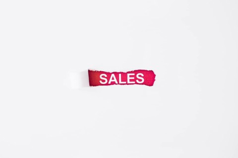 Sales inscription torn paper