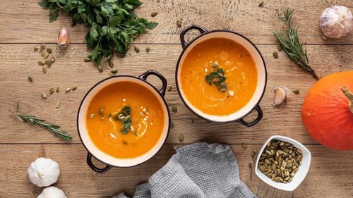 Flat lay food ingredients with pumpkin soup