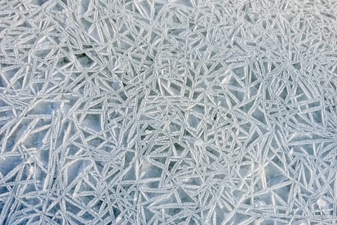 Frozen ice texture on the Dnieper river in Kiev, Ukraine, during winter, Europe