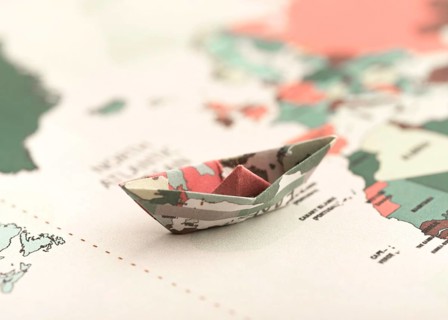 Small origami boat world map