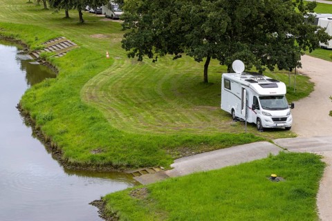 Motorhome in motorhome parking space, Lände Hilpoltstein on the banks of the Main-Danube Canal,