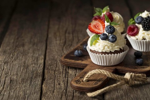 High view tasty cupcake copy space
