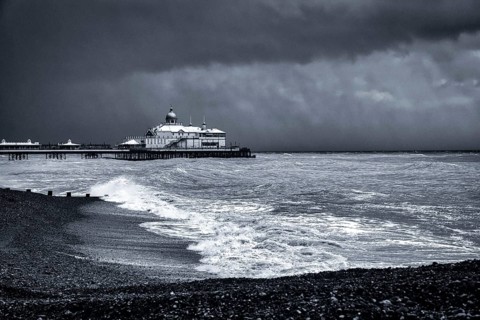 EASTBOURNE, EAST SUSSEX/UK - OCTOBER 21 : Tail End of Storm Brian Racing Past Eastbourne Pier in