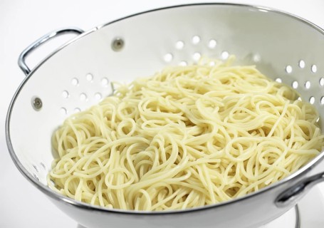 Spaghetti noodles in the skimmer
