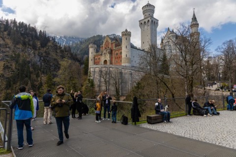 Tourists taking photos down the Neuschwanstein castle in Schwangau, a Bavarian village in Germany