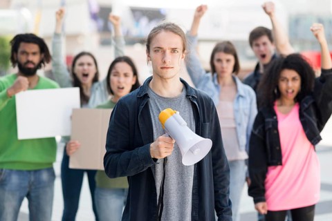Group people protesting using megaphones