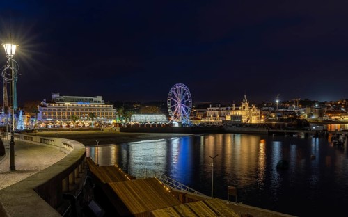 Christmas market with Ferris wheel, behind Palacio Seixas, Cascais, Portugal, Europe