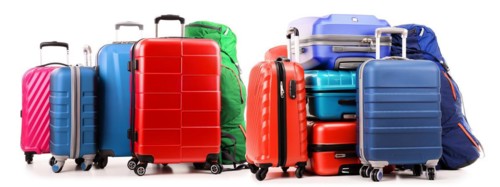 Luggage consisting of large suitcases and rucksacks isolated on white