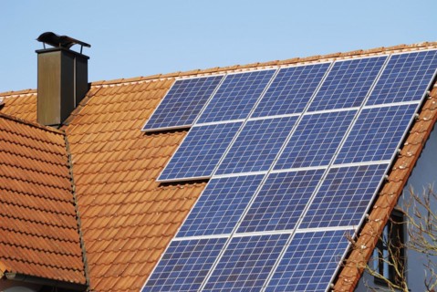 Ecological house roof with solar panels