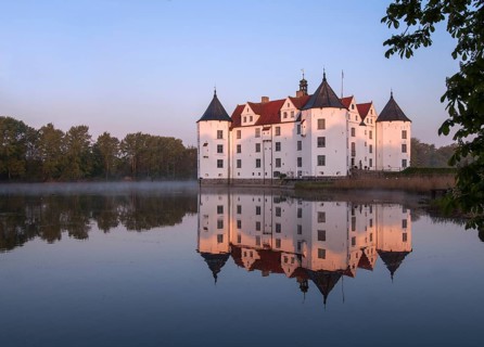 Glücksburg Castle with reflection in the lake, Schleswig-Flensburg, Schleswig-Holstein, Germany,