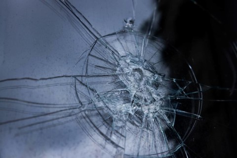 Pattern of smashed window pane, glass is splintered, window pane broken, close-up, Portbail,