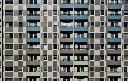 Facade of a prefabricated building with balconies in Hohenschönhausen, Lichtenberg district,