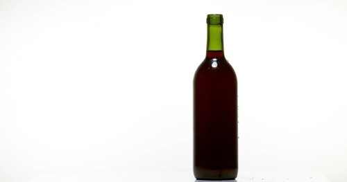 Bottle of Red Wine against White Background