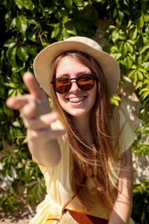 Medium shot girl wearing braces