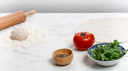 High angle pizza dough ingredients