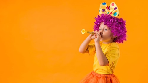 Girl with clown costume copy space
