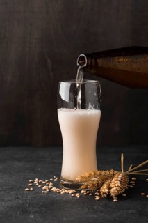 Beer bottle pouring beer glass