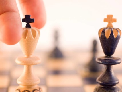 Conceptual with wood chess pieces