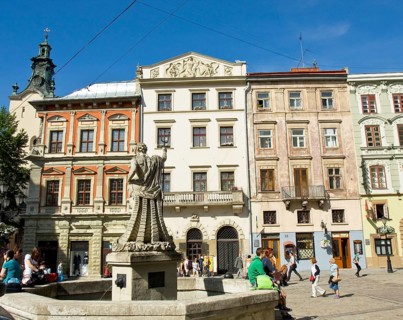 Fountain Neptune on Market square in historical centre of the town, UNESCO World Heritage site,