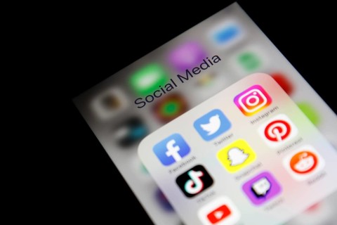 Social media icon, detailed view of a smartphone with social media apps, Facebook, Twitter,