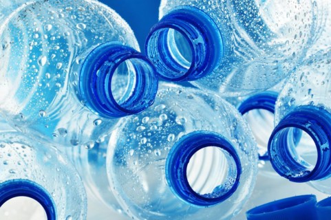Composition with empty polycarbonate plastic bottles of mineral water