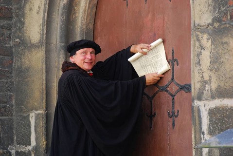 Actors of Martin Luther, in front of church portal, Wittenberg, Saxony-Anhalt, Luther's theses,