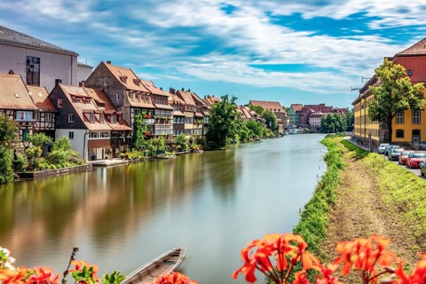 View of a quiet riverside town with traditional architecture and nature, Little Venice Bamberg seen