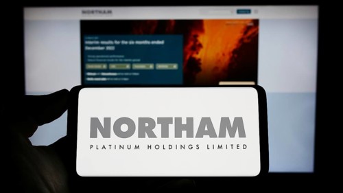 Stuttgart, Germany, 04-19-2023: Person holding cellphone with logo of company Northam Platinum